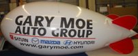large advertising balloon - 17ft. blimp without lettering from $951.00 17ft. helium blimp with logo or lettering from $1320.00. Custom colors available!